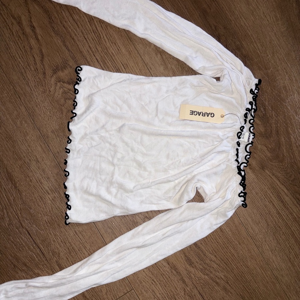 Garage White Long Sleeve Top with Black Lettuce Trim